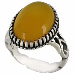 انگشتر عقیق زرد شرف الشمس معدنی خوشرنگ تراش دامله بیضی رکاب دور چنگ اشکی سیاه قلم نقره ۹۲۵ عیار