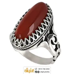 انگشتر عقیق سرخ خوشرنگ معدنی تراش دامله بیضی کشیده رکاب دور چنگ اشکی اره کاری نقره ۹۲۵ عیار