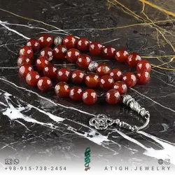 تسبیح عقیق سرخ تیره معدنی مرغوب بسیار خوشرنگ تراش لانه زنبوری 33 دانه دستساز کرکوش تُرک تک رشته ای بسیار زیبا