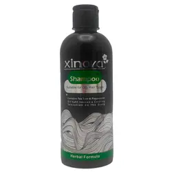 شامپو ژینووا حاوی زغال و روغن درخت چای مناسب موهای چرب حجم 400 میل