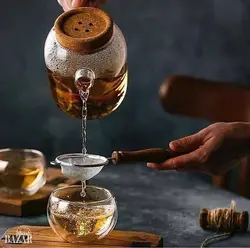 قوری در دکمه شعله مستقیم