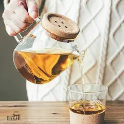 قوری در دکمه شعله مستقیم
