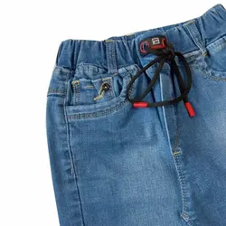 شلوار جین دخترانه/پسرانه راسته روشن (بند مشکی)