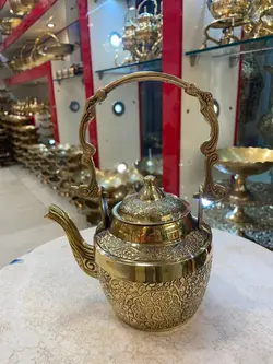 قوری برنجی دسته دار طرح طاووس هندی