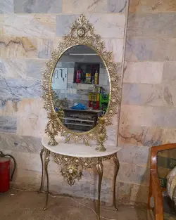 آینه کنسول بیضی برنزی گل آفتابگردان با شمعدان