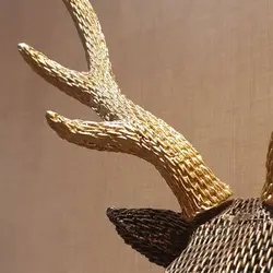 دیوار کوب گوزن بافتنی
