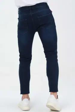 شلوار جین برش اسلیم فیت ساده دور کمر لایکرا سرمه ای تیره قالب تنگ مردانه برند BEHALLE کد 1667279724