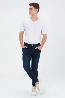 شلوار جین برش اسلیم فیت ساده دور کمر لایکرا سرمه ای تیره قالب تنگ مردانه برند BEHALLE کد 1667279724