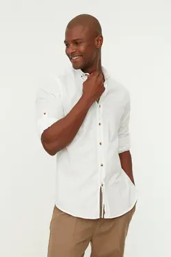 پیراهن اسلیم فیت دکمه‎دار مردانه یقه آستین بلند سرشونه دار سفید برند TRENDYOL MAN کد 1645298425