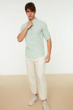 پیراهن اسلیم فیت مردانه آستین بلند سرشونه دار یقه دیپلمات ساده سبز برند TRENDYOL MAN کد 1644473812