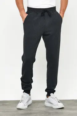 شلوار راحتی اسلیم فیت مردانه جاگر کشی پاچه داخل مشکی برند COMEOR کد 1641862090