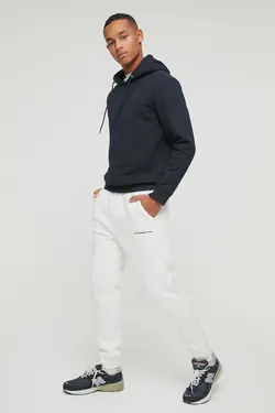 شلوار راحتی متناسب مردانه قلاب دوزی شده شیری برند TRENDYOL MAN کد 1647099660