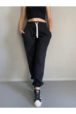 شلوار راحتی جیب دار کشی پاچه زنانه مشکی برند Relax family xf کد 1641783068