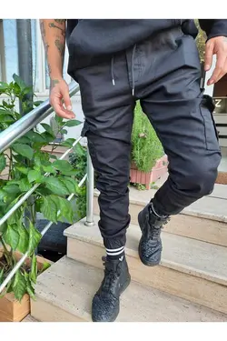 جیب دار دور کمر جاگر کشی پاچه شلوار مشکی مردانه برند Tarz Cool کد 1679948919