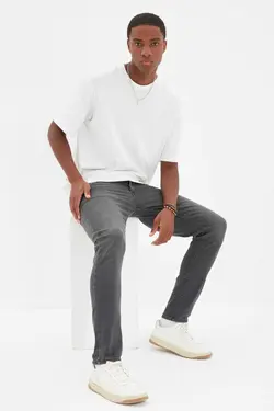 شلوار جین پارچه کشی اندامی طوسی مردانه برند TRENDYOL MAN کد 1683350078