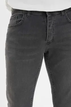 شلوار جین پارچه کشی اندامی طوسی مردانه برند TRENDYOL MAN کد 1683350078