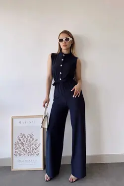 سرهمی جیب دار ساده پارچه بلند تک طرح یقه ایستاده بدون آستین سرمه ای کمربند زنانه برند New Laviva کد 1688407521