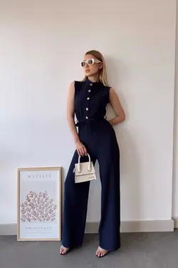 سرهمی جیب دار ساده پارچه بلند تک طرح یقه ایستاده بدون آستین سرمه ای کمربند زنانه برند New Laviva کد 1688407521