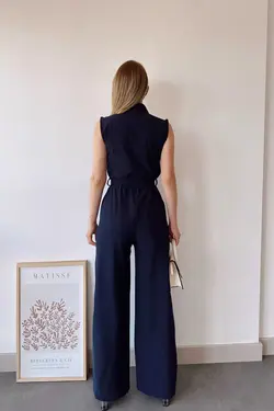 سرهمی جیب دار ساده پارچه بلند تک طرح یقه ایستاده بدون آستین سرمه ای کمربند زنانه برند New Laviva کد 1688407521