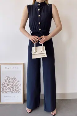 سرهمی جیب دار ساده پارچه بلند تک طرح یقه ایستاده بدون آستین سرمه ای کمربند زنانه برند New Laviva کد 1688407521