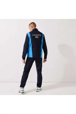 ست لباس راحتی متناسب یقه ایستاده سرمه ای رنگ مردانه برند Lacoste کد 1696343532