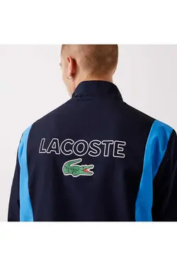 ست لباس راحتی متناسب یقه ایستاده سرمه ای رنگ مردانه برند Lacoste کد 1696343532