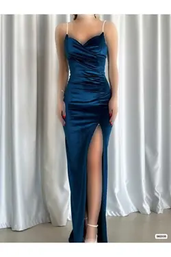 لباس مجلسی نامزدی پارچه مخملی چاک دار سنگی آبی نفتی بند‎دار زنانه برند WOST کد 1703751398