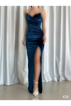 لباس مجلسی نامزدی پارچه مخملی چاک دار سنگی آبی نفتی بند‎دار زنانه برند WOST کد 1703751398