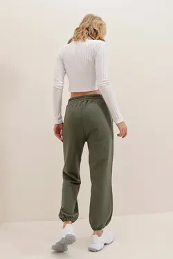 شلوار راحتی نخی کشی پاچه یشمی زنانه برند Trend Alaçatı Stili کد 1648900147