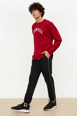 شلوار راحتی متناسب خط‎دار پاچه لاستیک مردانه مشکی برند TRENDYOL MAN کد 1651058625