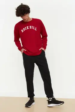 شلوار راحتی متناسب خط‎دار پاچه لاستیک مردانه مشکی برند TRENDYOL MAN کد 1651058625