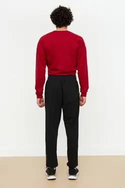 شلوار راحتی متناسب خط‎دار پاچه لاستیک مردانه مشکی برند TRENDYOL MAN کد 1651058625