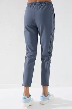 شلوار راحتی پاچه لوله تفنگی اسلیم فیت طرح پلنگی کنار نفتی زنانه برند Tommy Life کد 1651209967