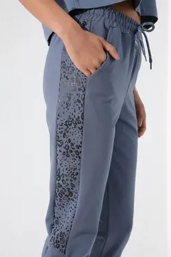 شلوار راحتی پاچه لوله تفنگی اسلیم فیت طرح پلنگی کنار نفتی زنانه برند Tommy Life کد 1651209967