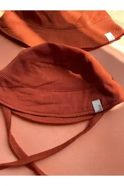 کلاه بچه گانه ارگانیک muslin آجری سطل برند Meymen Baby کد 1652584626