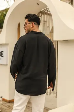 پیراهن گشاد بافتنی مشکی برند outfiit man کد 1652814927