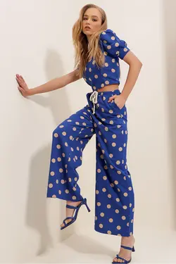 کتان کمر پالازا طرح‎دار خال خالی کمربند‎دار دو جیبه آبی شلوار زنانه برند Trend Alaçatı Stili کد 1652768900