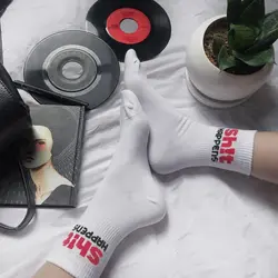 جوراب شت هپنز سفید - هیچ استور - خرید اینترنتی اکسسوری فانتزی