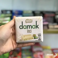 شکلات سفید داماک نستله پسته ای 65 گرم