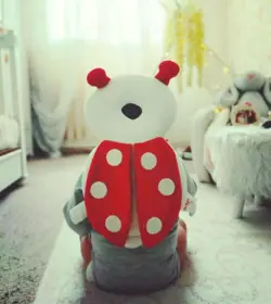 ضربه گیر سر نوزاد و کودک طرح کفشدوزک نی نی دوست - قیمت خرید | مادرآن