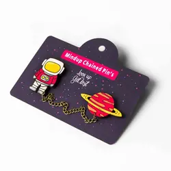 پین زنجیردار فضانورد قرمز