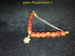 دستبند سنگ مهره دار طرح 12 آویز دار طرح گل رنگ عسلیدرفروشگاه پیام کالا