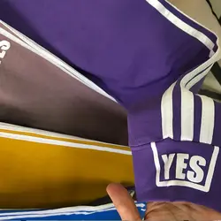 شلوار اسلش بغل نواردار طرح YES