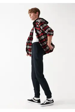 شلوار اسلیم ساده مردانه ماوی ۰۰۱۰۰۷۸-۸۰۰۲۲-سیاه