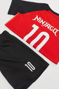 لباس ورزشی پسرانه نارنجی اچ اند ام