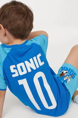 لباس ورزشی پسرانه فیروزه ای اچ اند ام