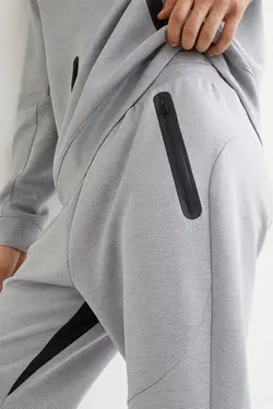 شلوار جاگر مردانه خاکستری روشن اچ اند ام