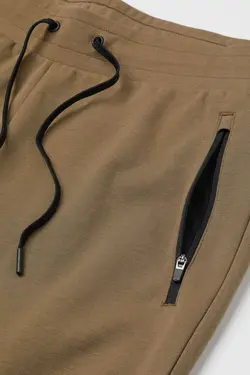 شلوار جاگر مردانه خاکی اچ اند ام