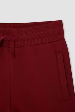 شلوار راحتی جاگر پسرانه زرشکی دفاکتو