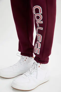 شلوار راحتی جاگر مردانه زرشکی دفاکتو